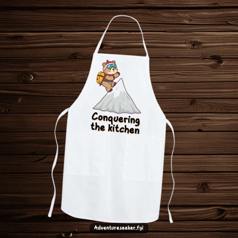 Funny Bear Mountaineer Apron: Playful bear climbing a stylized mountain peak, adding humor and practicality to kitchen adventures.