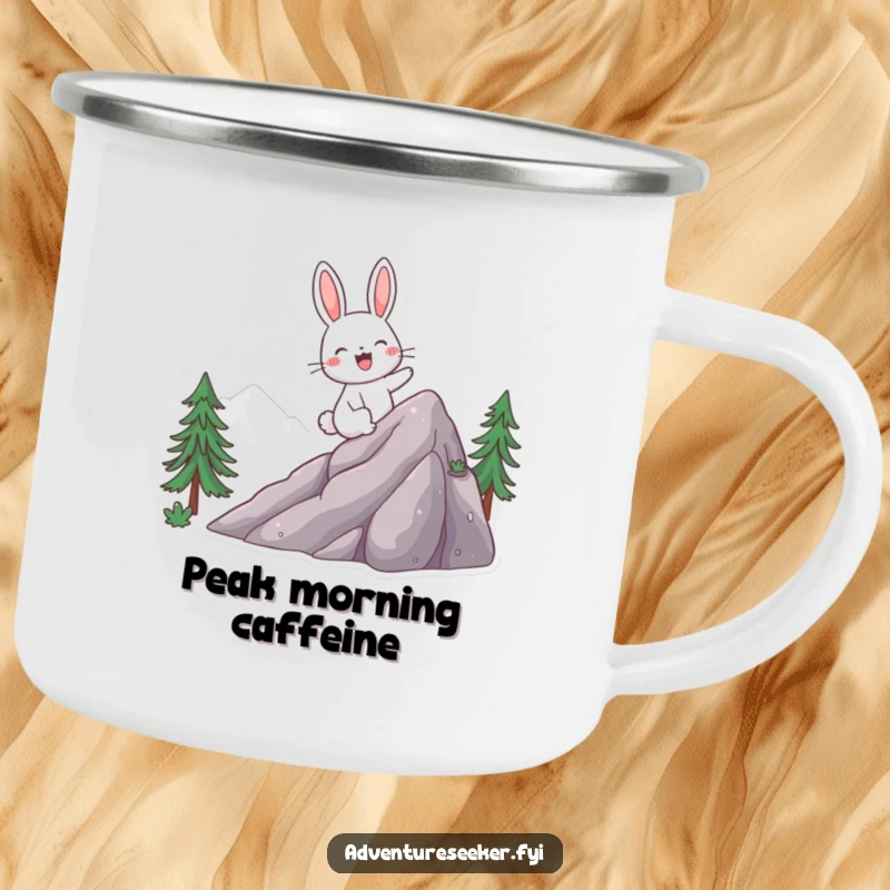 Funny camping mug featuring a giggling rabbit character excitedly climbing a mountain, ideal for outdoor enthusiasts.