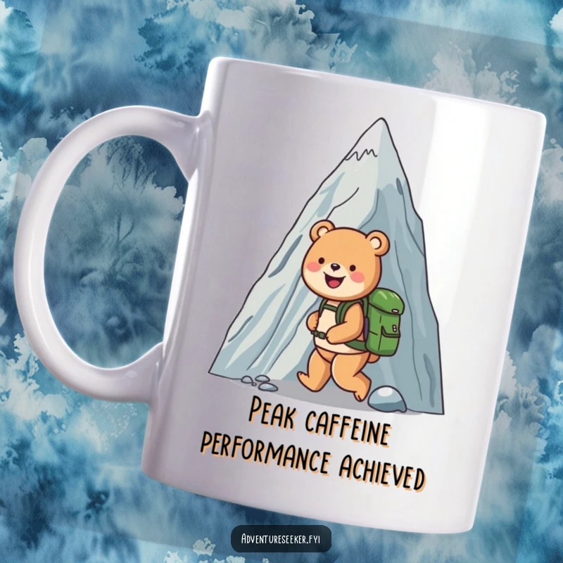 Funny mug showing a happy bear with a backpack scaling a giant mountain, conveying a sense of achievement and humor.