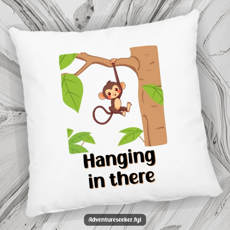 Funny pillow depicting a mischievous monkey character hanging playfully from a jungle tree branch, offering comfort and humor.
