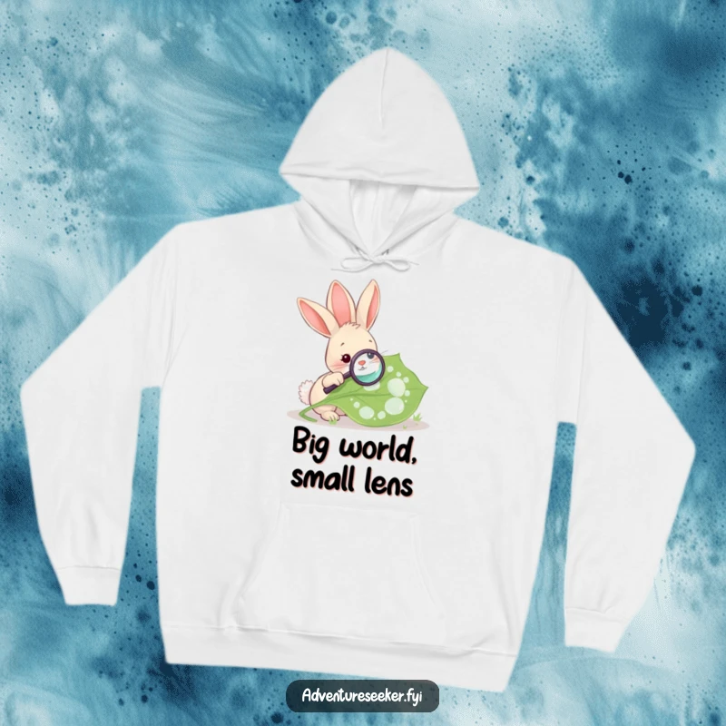 Funny Rabbit Magnifying Leaf Hoodie. A rabbit intently examines a large leaf with a magnifying glass, perfect for cozy exploration.