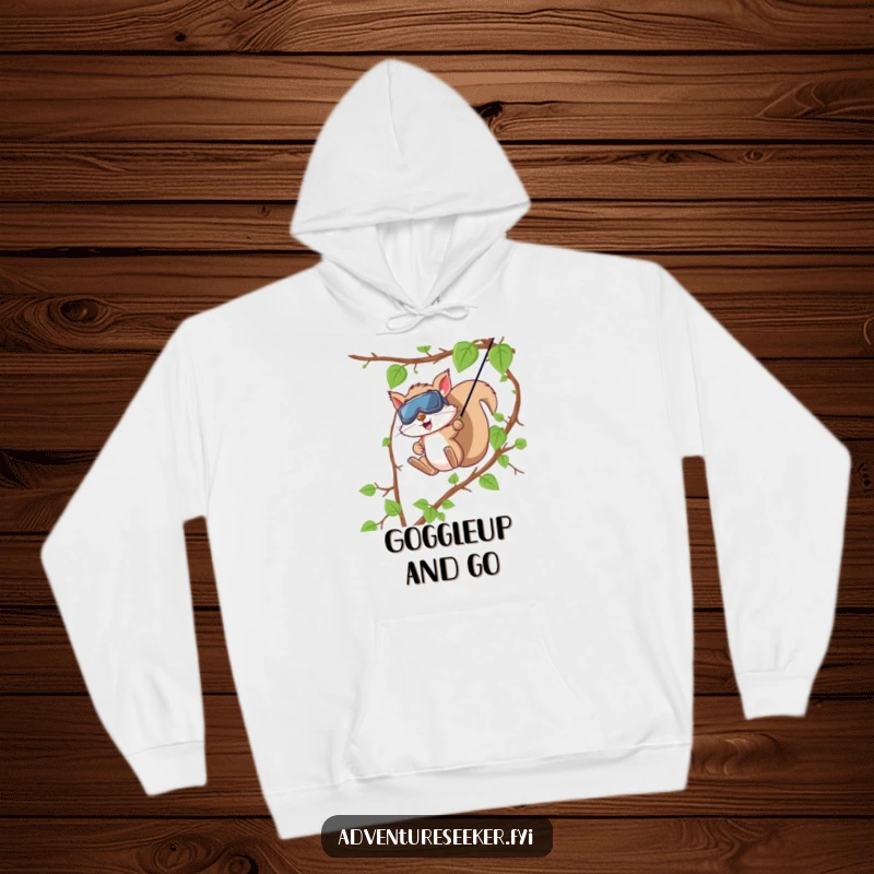 Funny Squirrel Zip Line Hoodie. A brave squirrel with goggles speeds down a vine zip line, offering warmth and humor.