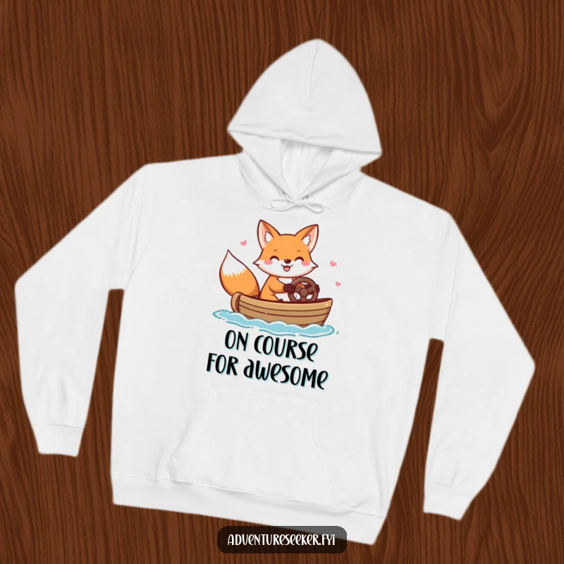 Funny hoodie featuring a cheerful fox character happily steering a small boat, perfect for staying warm on any water journey.