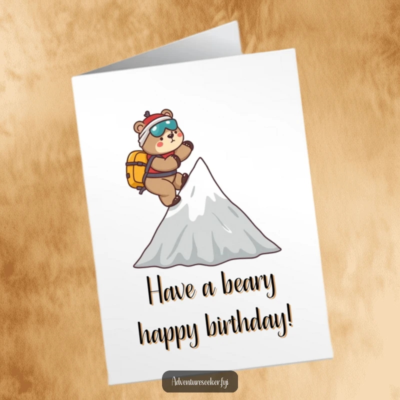 Funny Free Printable Birthday Card: Playful bear mountaineer climbing a stylized mountain, reaching the peak with joy.