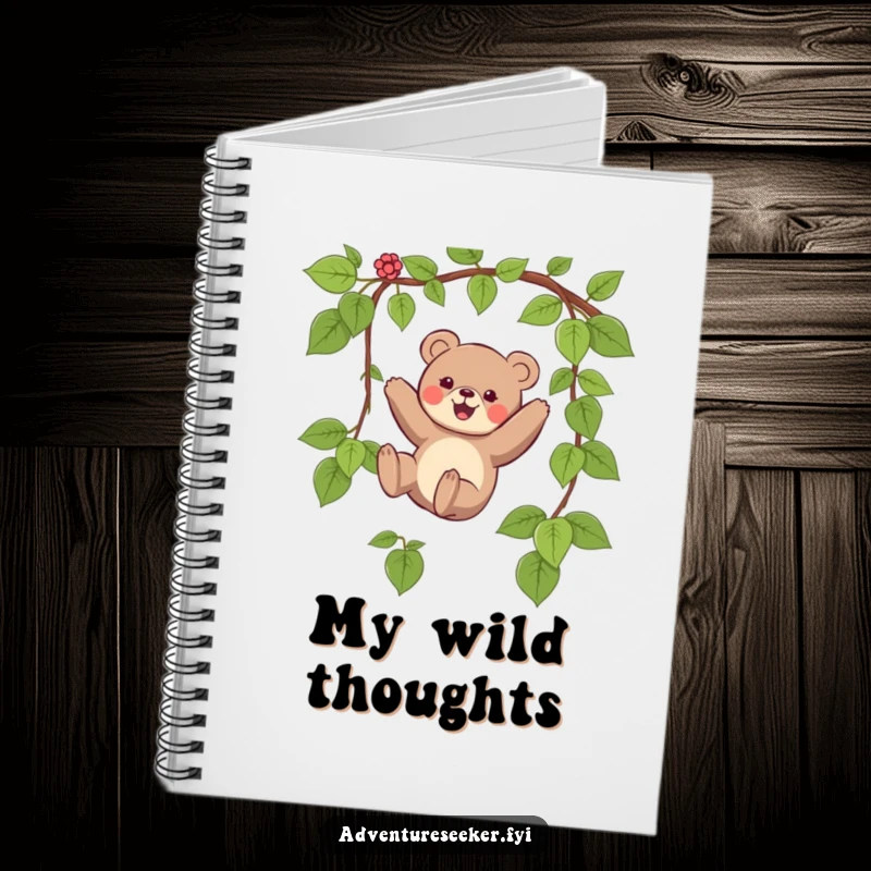 Funny notebook with a small bear character joyfully swinging on a vine, inspiring creativity and capturing adventures.