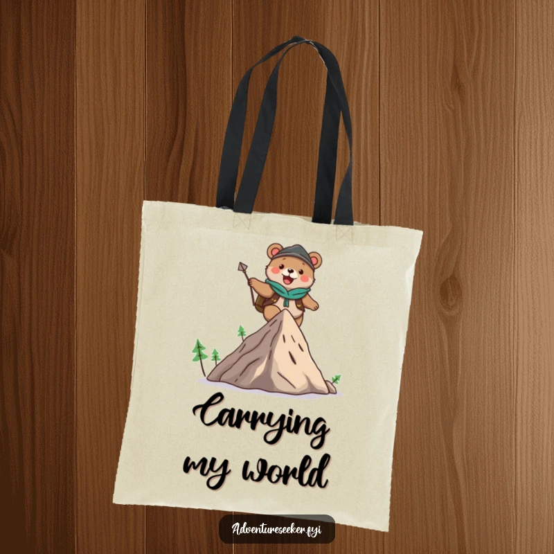 Funny tote bag featuring a cute bear adventurer character joyfully climbing a mountain, perfect for carrying your belongings with a smile.