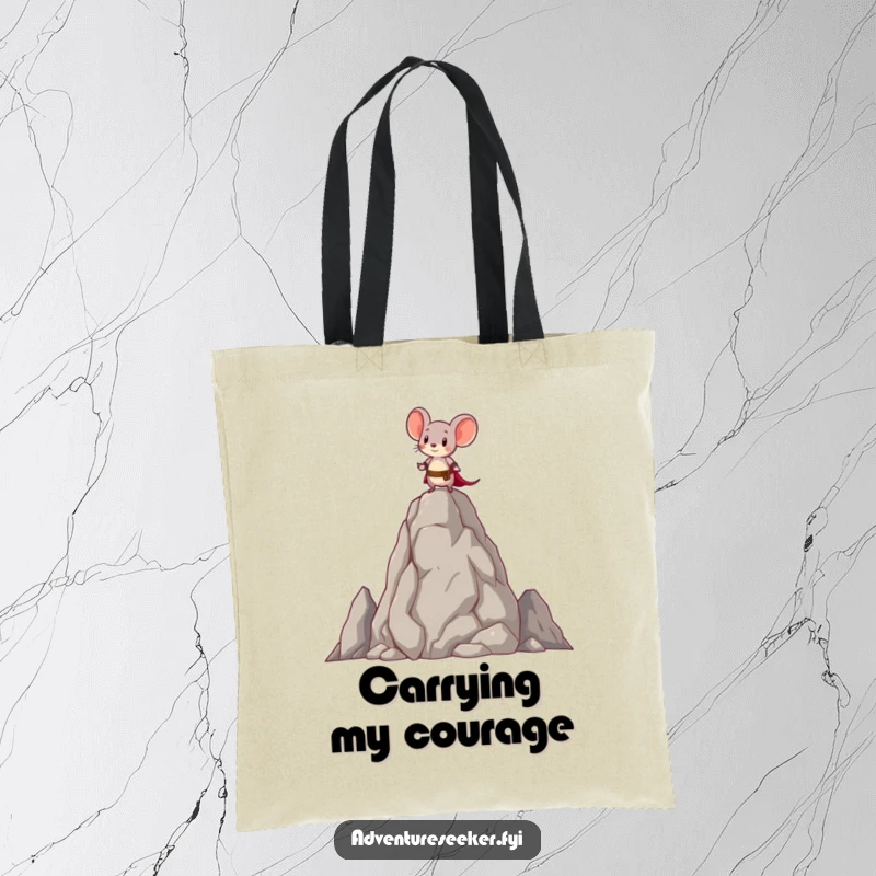 Funny tote bag with a brave little mouse character standing atop a tall, ancient rock, showcasing a courageous design.