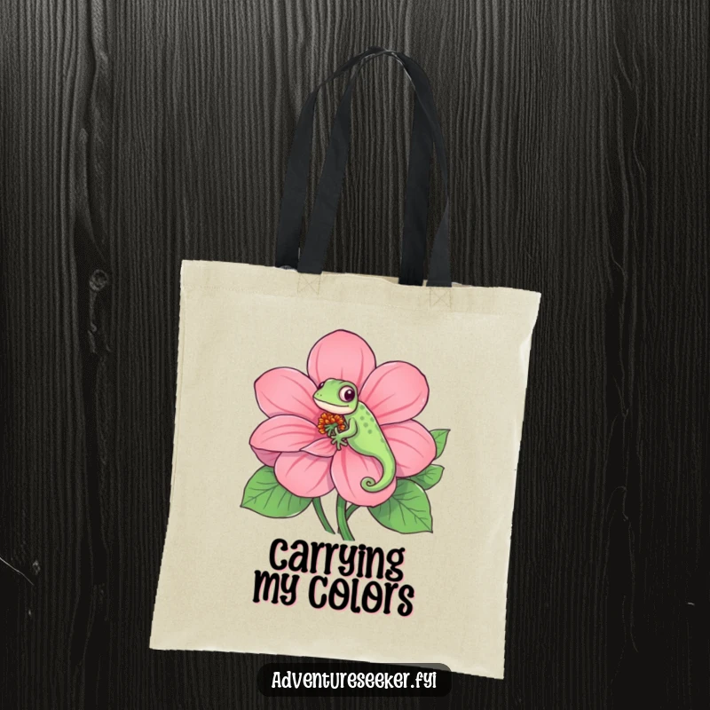 Funny tote bag featuring a playful chameleon seamlessly merging with a giant, rainbow-hued flower, a visually amusing and practical accessory.